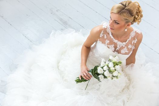 Wedding. Attractive bride with bouquet