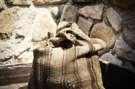 Old Linen Sack Over Vintage Stone Background