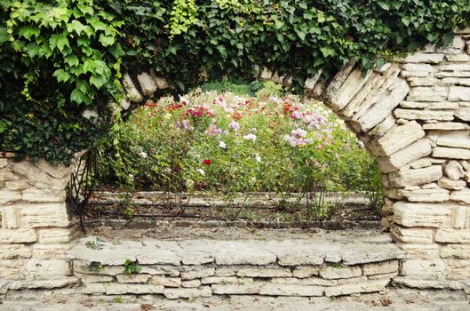 Photo of the Natural Stone Wall With Greenery