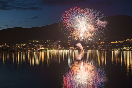 Fireworks on the Varese Lake in a summer evening, Gavirate - Varese