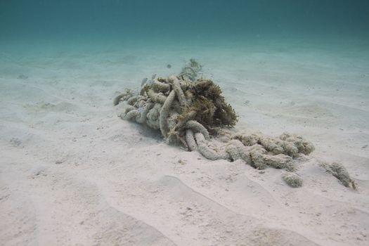 chains for anchoring a boat at the bottom of the ocean