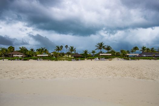dark storm clouds over a beach resort