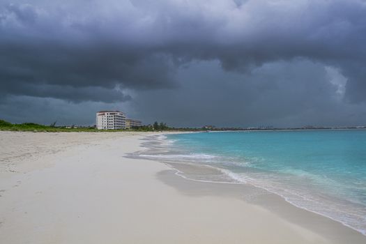 dark storm clouds over a beach resort