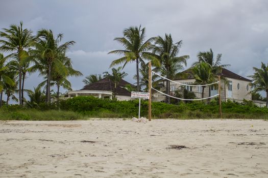 Beach side private property with volleyball net
