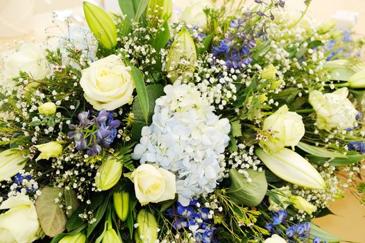 Closeup detail showing flower arrangement at wedding reception