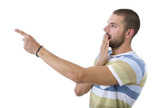 young casual man pointing, isolated on white