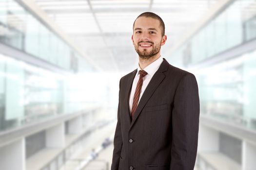 young happy business man at the office