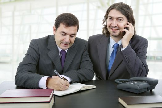 business team working at a desk at the office