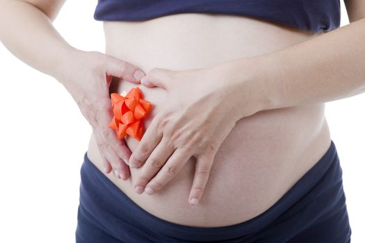 Closeup of pregnant woman at white background