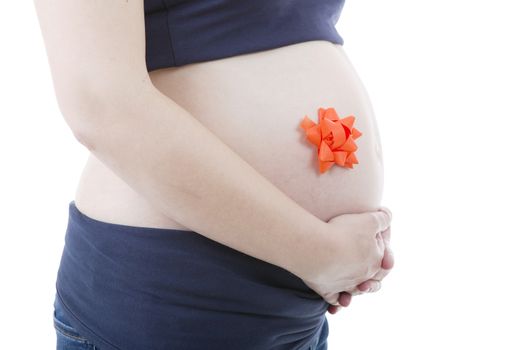 Closeup of pregnant woman at white background