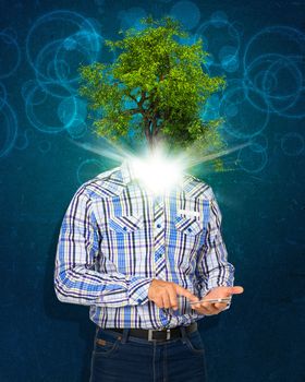 Man hold smart phone. Green tree and bright light instead his head. Eco concept