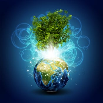 Earth with magical green tree and rays of light on dark background. Elements of this image are furnished by NASA