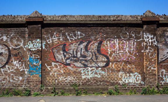 View of graffiti on the brick wall