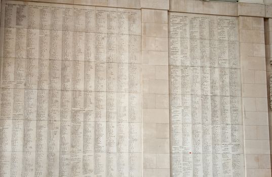 Ypres Menin gate memorial showing names of falling soldiers.