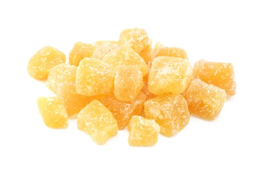 Cubes of crystallised stem ginger, isolated on a white background