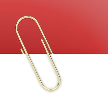 Close up of gold paper clip holding a blank paper sheet