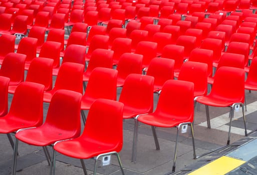 View of many red chairs ready for conference