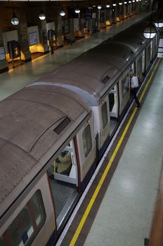London Underground Platform With Embarking Passengers Onto the Train Very High Fuel Taxes and the Congestion Charge Discourages the use of Public Transport