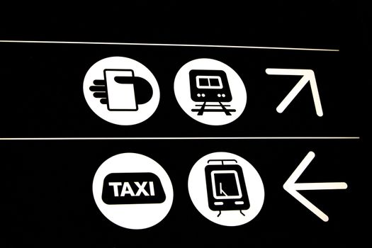 An information sign at the airport, bus and taxi 