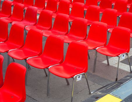 View of many red chairs ready for conference