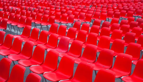 View of many red chairs ready for conference