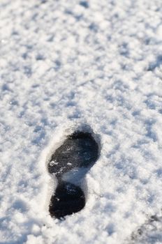 winter background - footsteps in the snow