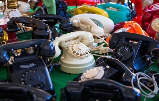 View of vintage telephones in the street market