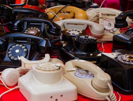 View of vintage telephones in the street market