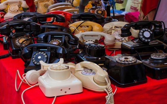 View of vintage telephones in the street market
