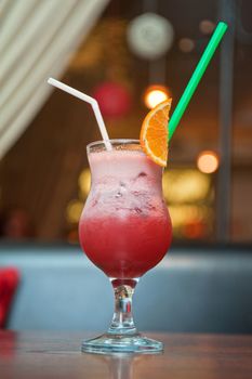 berry milkshake with orange fruit
