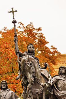 Queen Isabella of Castile Statue Riding a Horse  Marching into Granada 1492 with Cardinal Mendoza and Gonzalo de Cordoba Paseo de la Castellena Madrid Spain.  Statue made of Bronze and Stone by Manuel Oms y Canet in 1883.