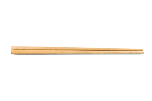 Wooden pairs of chopsticks on white background