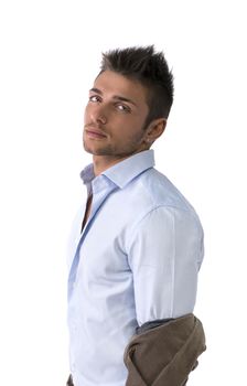 Profile shot of handsome young man with shirt, taking off jacket, isolated
