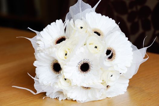 Brides bouquet with white flowers on wedding day