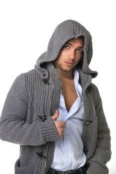 Good looking young man wearing winter hoodie sweater on shirt
