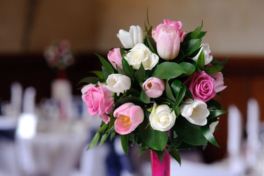 Wedding flowers close up on tables at reception