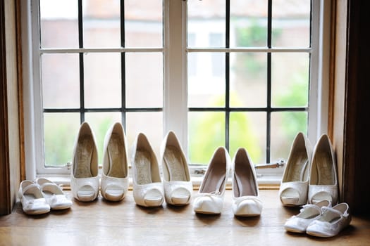 Bride and bridesmaids shoes in window