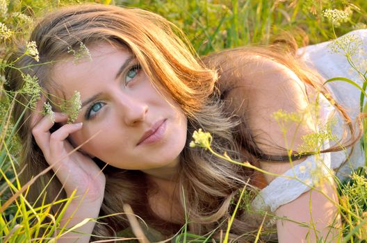 Portrait of  young woman laying down 