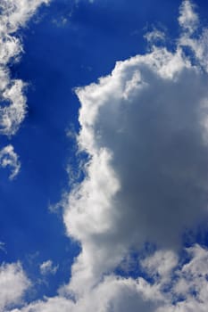 Blue sky and white clouds and the sun