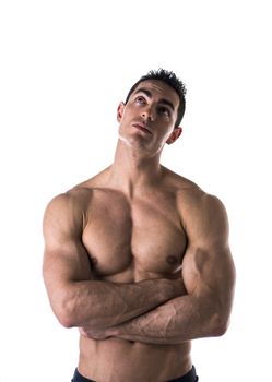 Shirtless man thinking while looking far away on white background