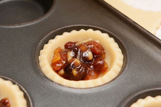 Close up of traditional mincemeat in pastry shell to make a mince pie