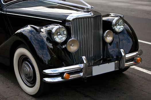 Classic Rolls Royce with the famous flying lady emblem mascot