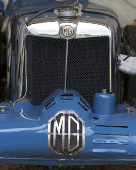 Logo of MG on Classic Sport car