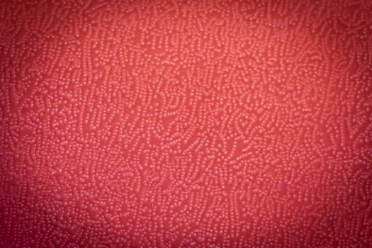 natural red fabric background textile texture close-up