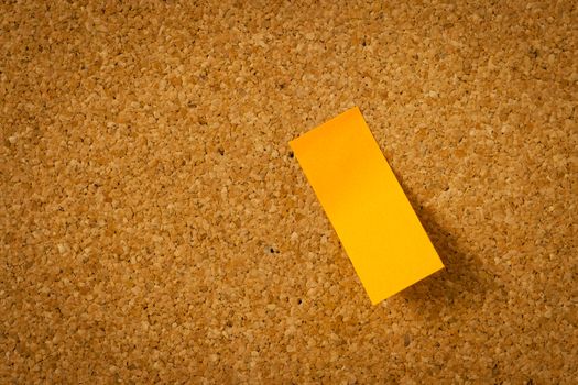 image of color blank post-it reminder on corkboard