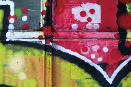The cross makes the graffiti interesting