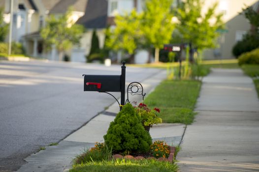 Black Mail Box in Front of a House