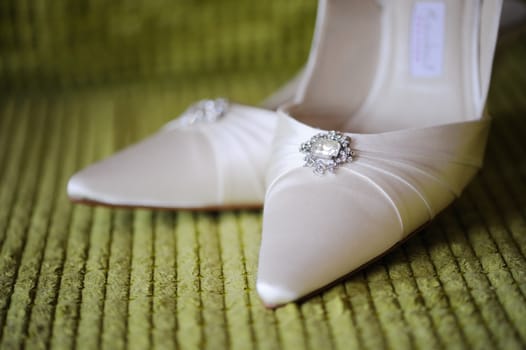 Brides shoes closeup on wedding day