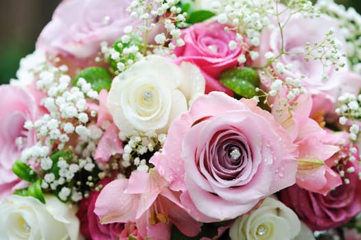 Brides pink and white roses on wedding day