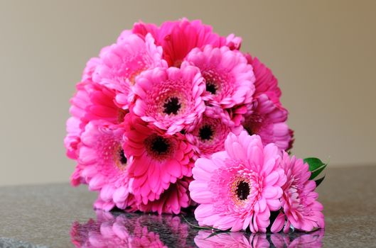 Pink bouquet and buttonhole on wedding day